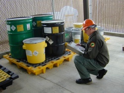 Hazardous Waste Inspector Taking Notes