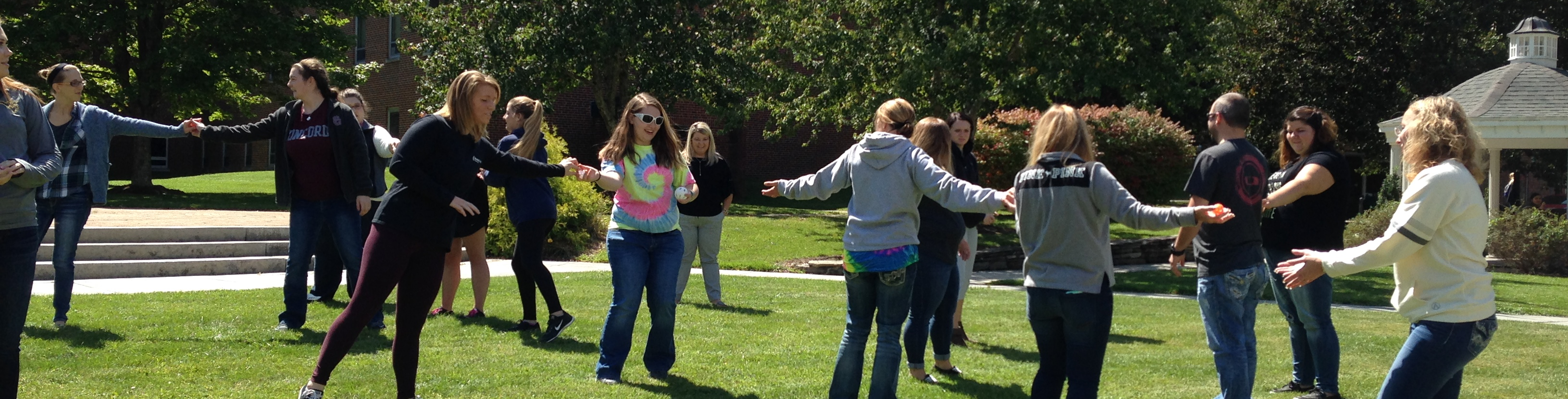 Pre-Service teachers go through the Blue River Watershed activity and simulate water flowing through a watershed