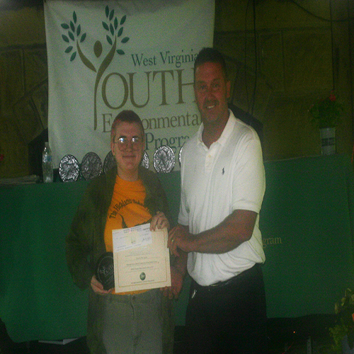 Erik Sims presenting the Go Mart Energy Essay Contest Award to winner Eowyn McCutchan.