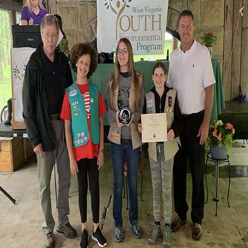 Ed Maguire and Erik Sims presenting the West Virginia State Parks Award to Girl Scout Troop 1839 from Kanawha County.